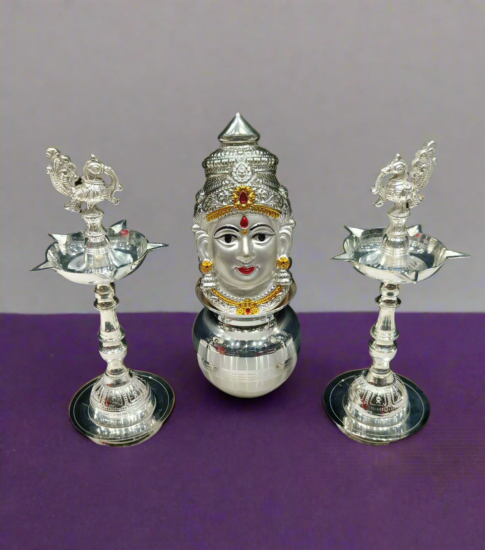 silver plated peacock diya with kalash and lakshmi face