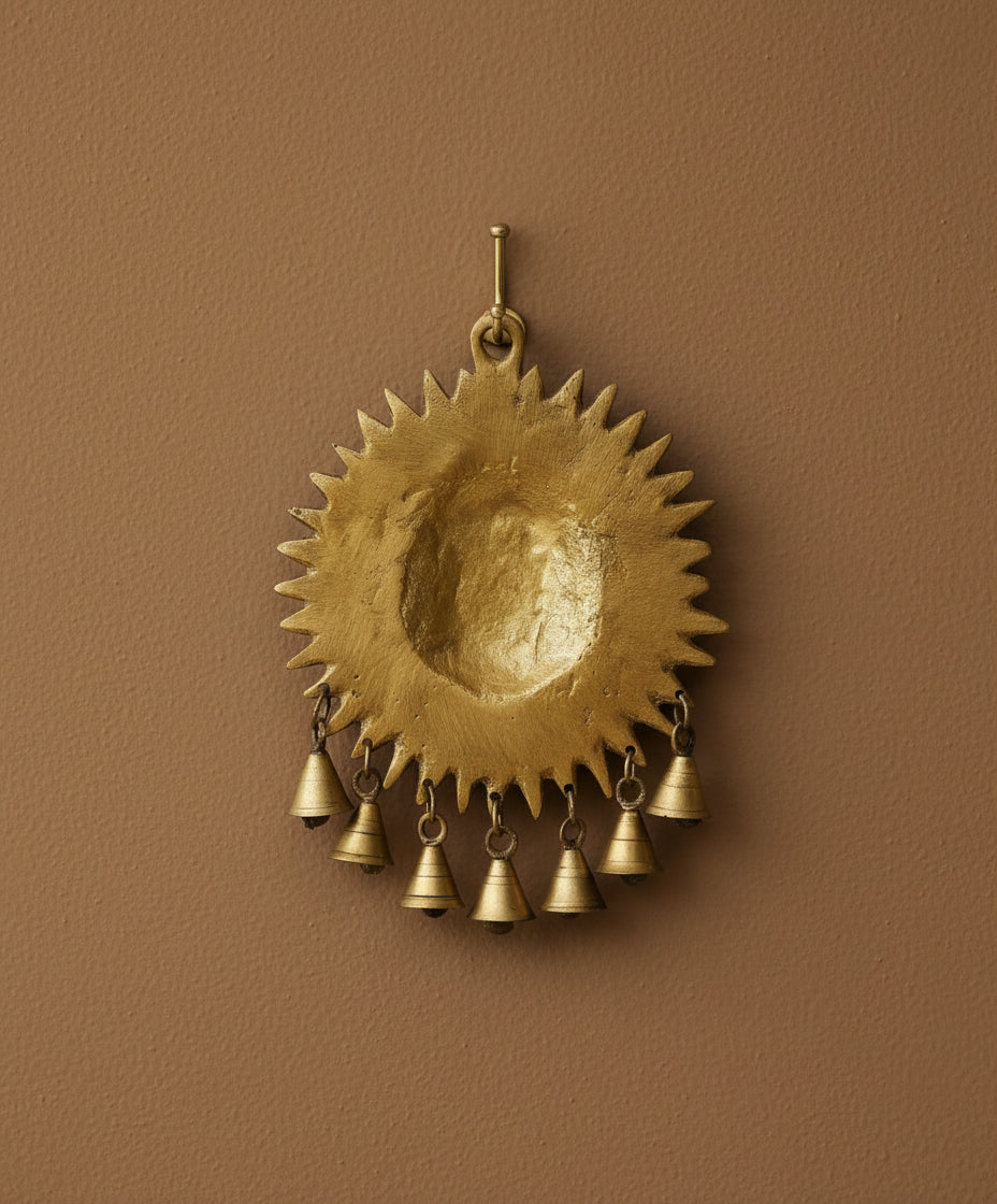 brass sun wall hanging with bells for home décor