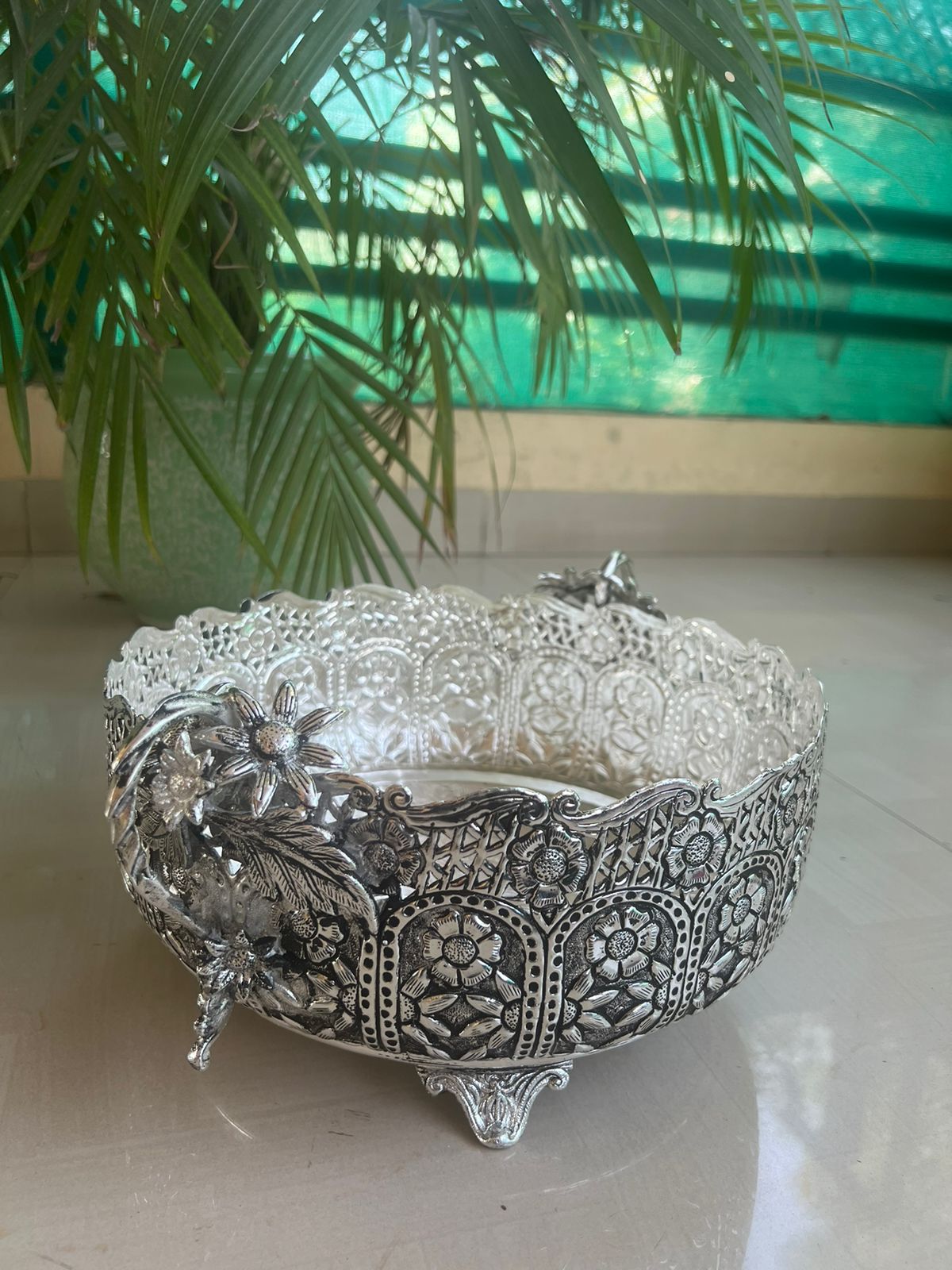 german silver fully carved round designer urli/basket with flower handles for home décor/gift item