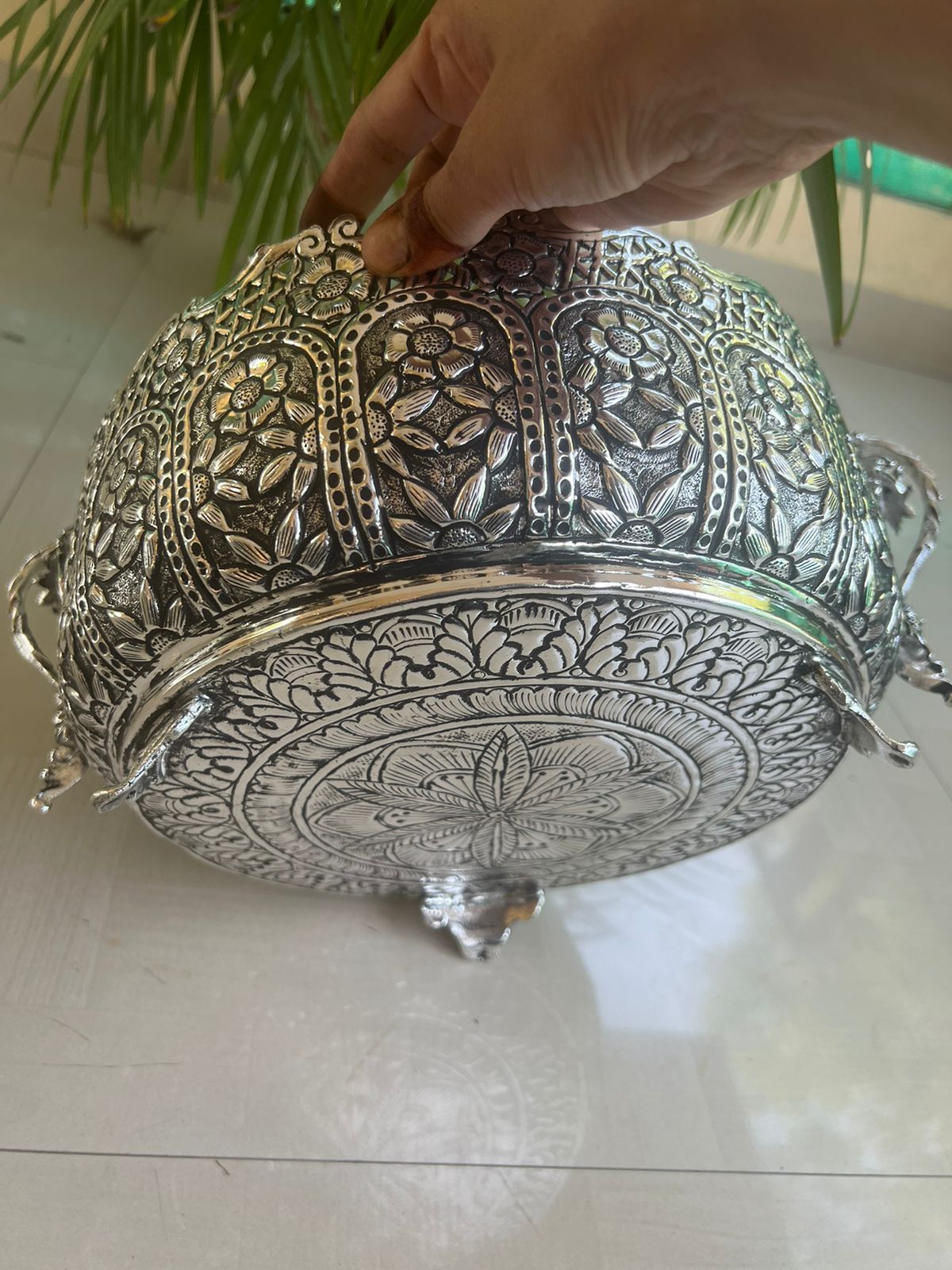 German silver fully carved round designer urli/basket with flower handles