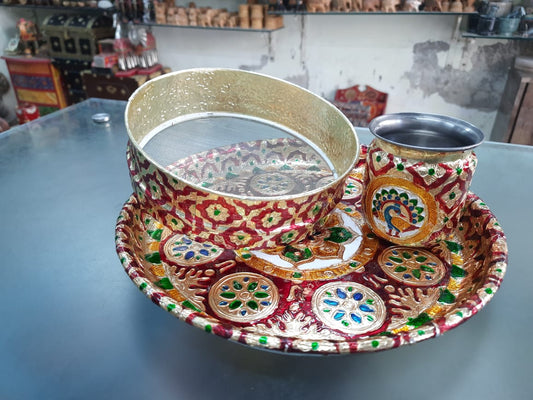 red and golden color stainless steel pooja thali set