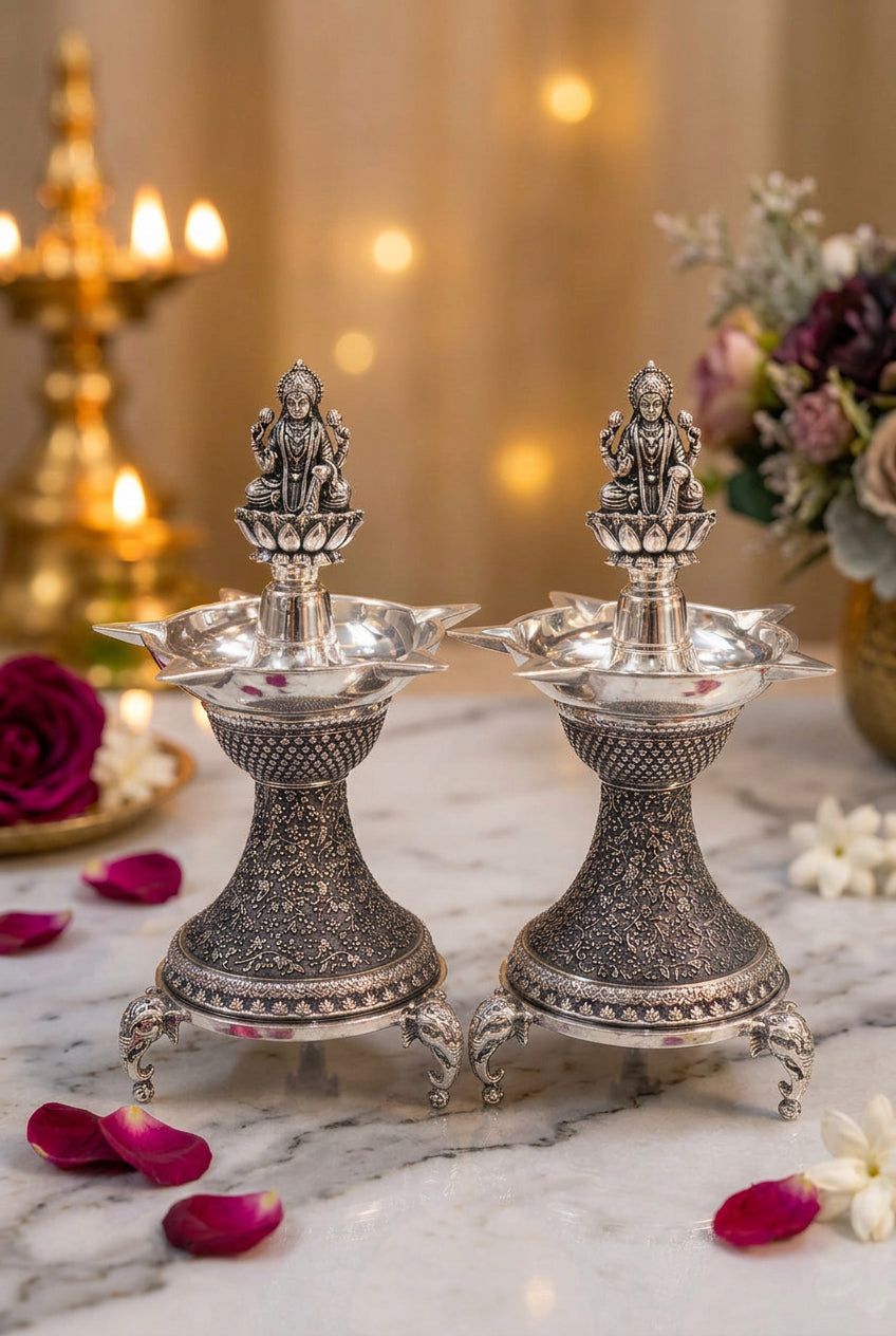 german silver lakshmi diya with elephant legs fully carved , 7" for diwali/ housewarming gift