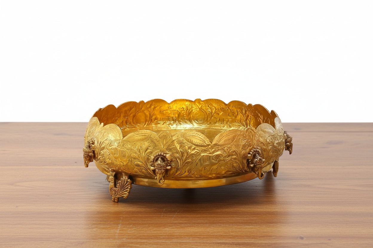 Brass Ganesh Urli with Peacock Legs – Artistic Home Décor & Gift Item