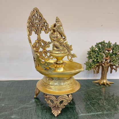 brass Ganesh urli bowl with 2 side peacock décor