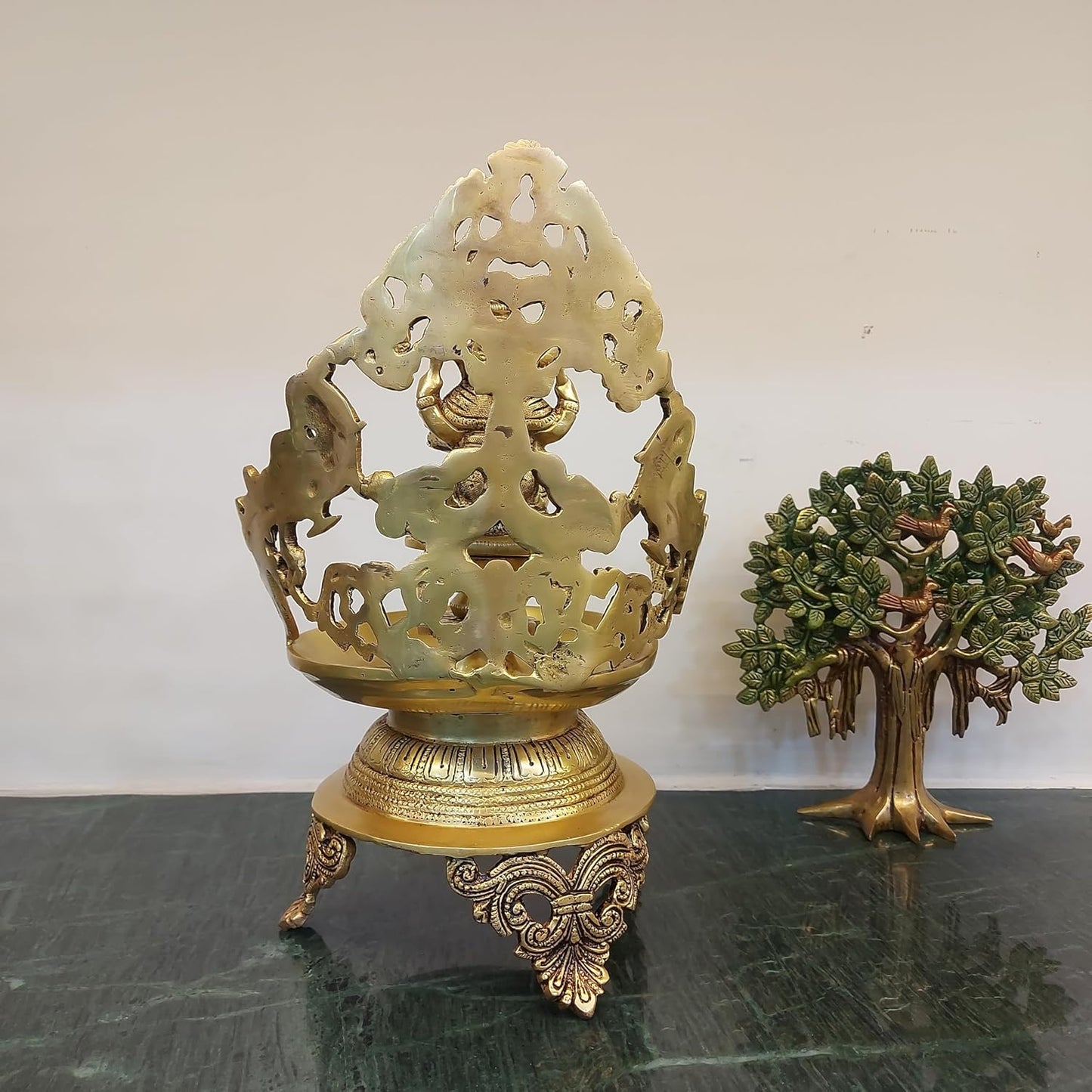 brass Ganesh urli bowl with 2 side peacock décor