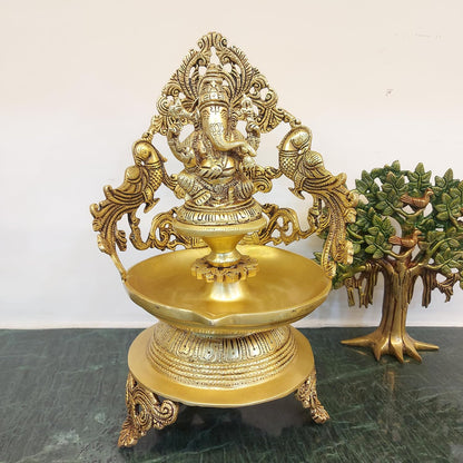 brass Ganesh urli bowl with 2 side peacock décor