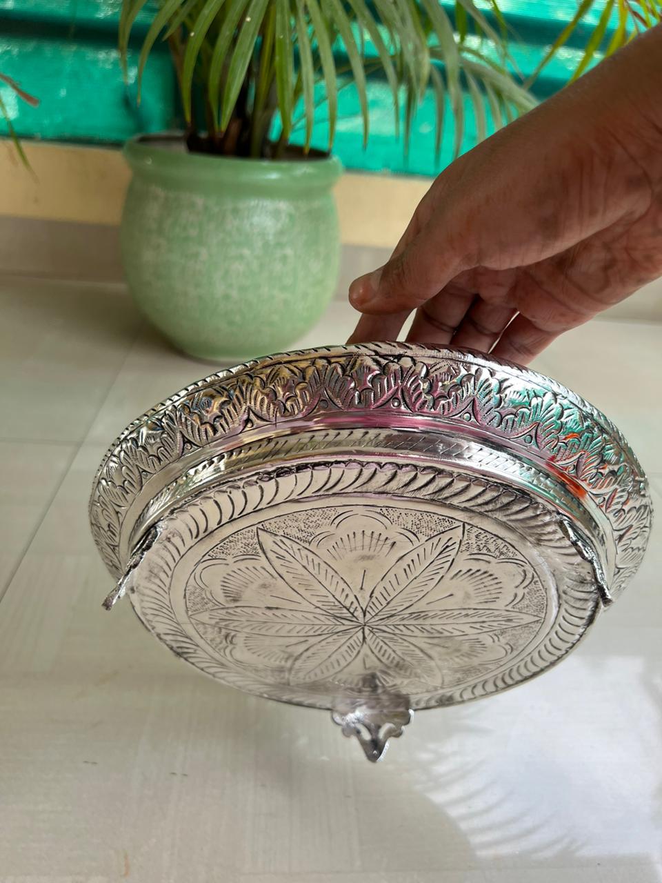 German silver Round urli with stands fully carved