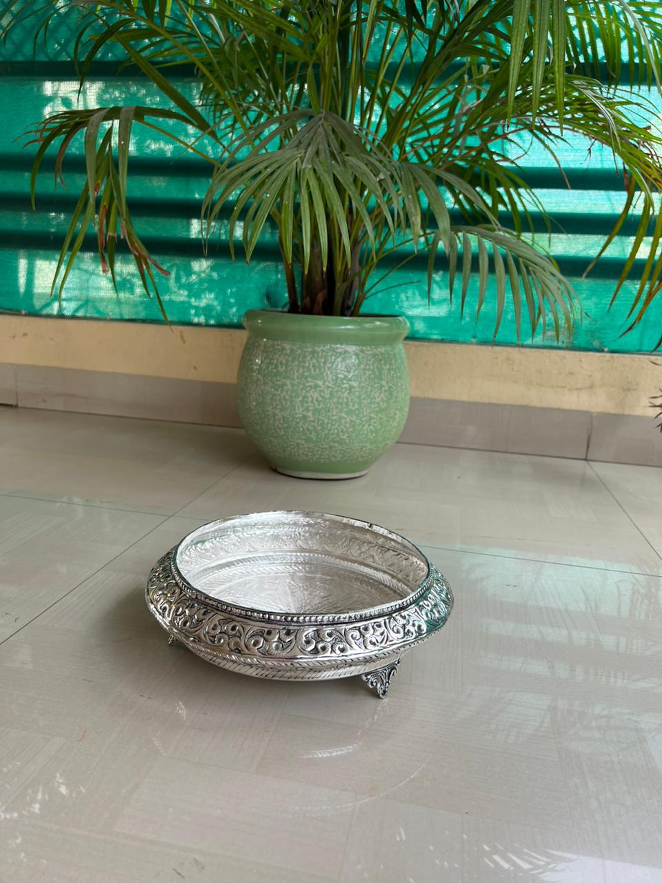 German silver Round urli with stands fully carved