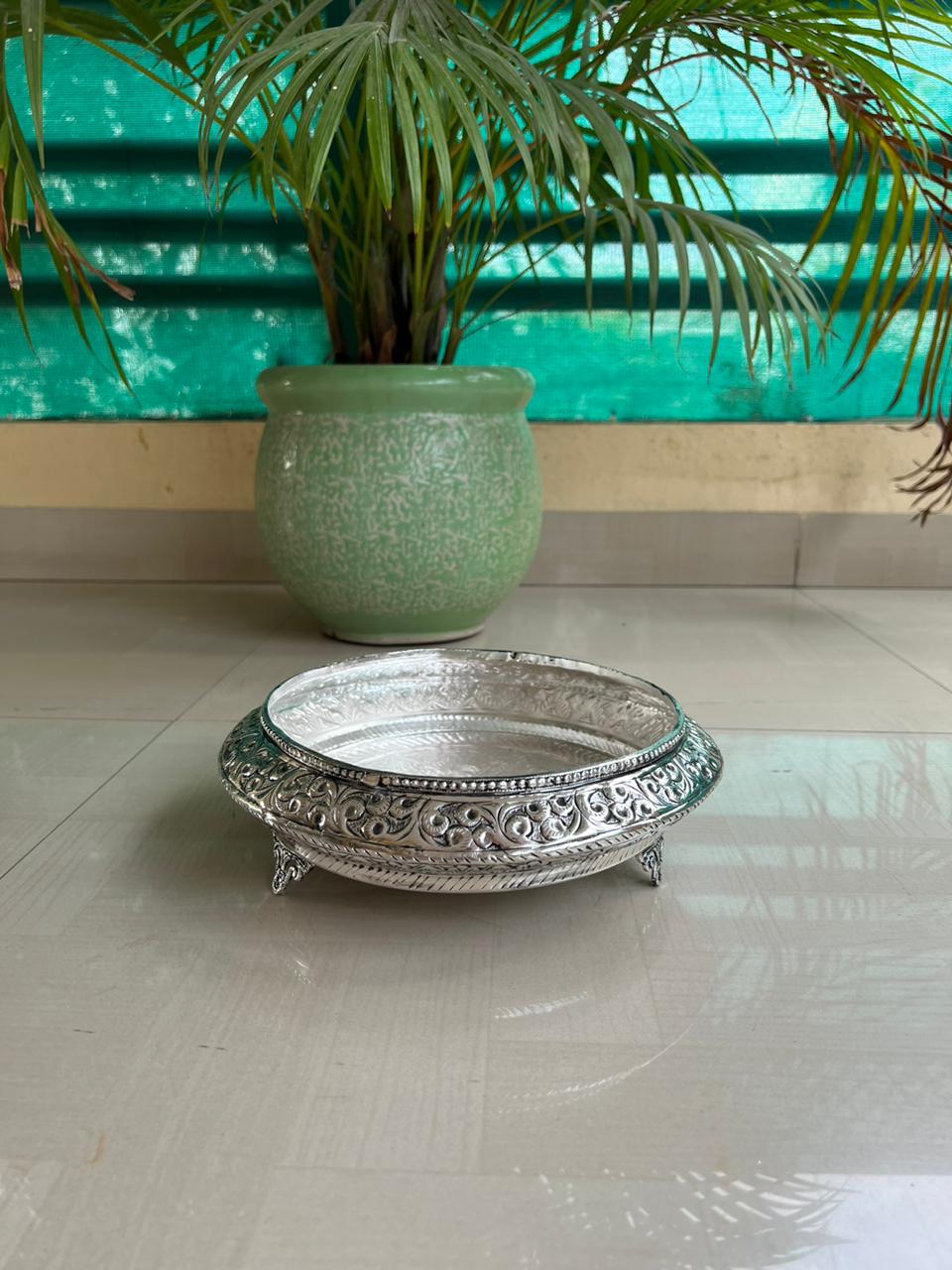 German silver Round urli with stands fully carved