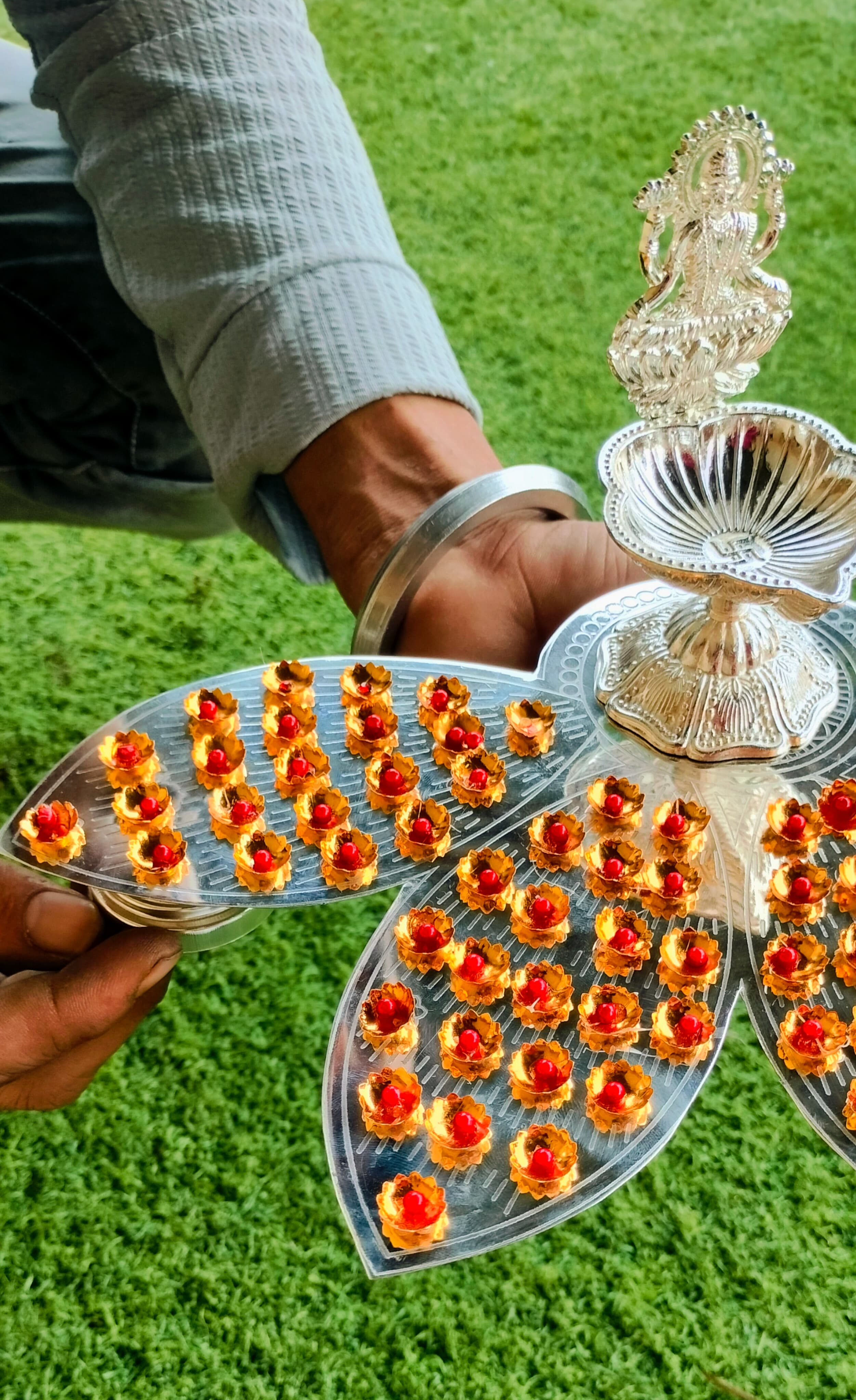 German silver lotus petals Ashtotram stand with 108 Golden red stone flower with lakshmi diya