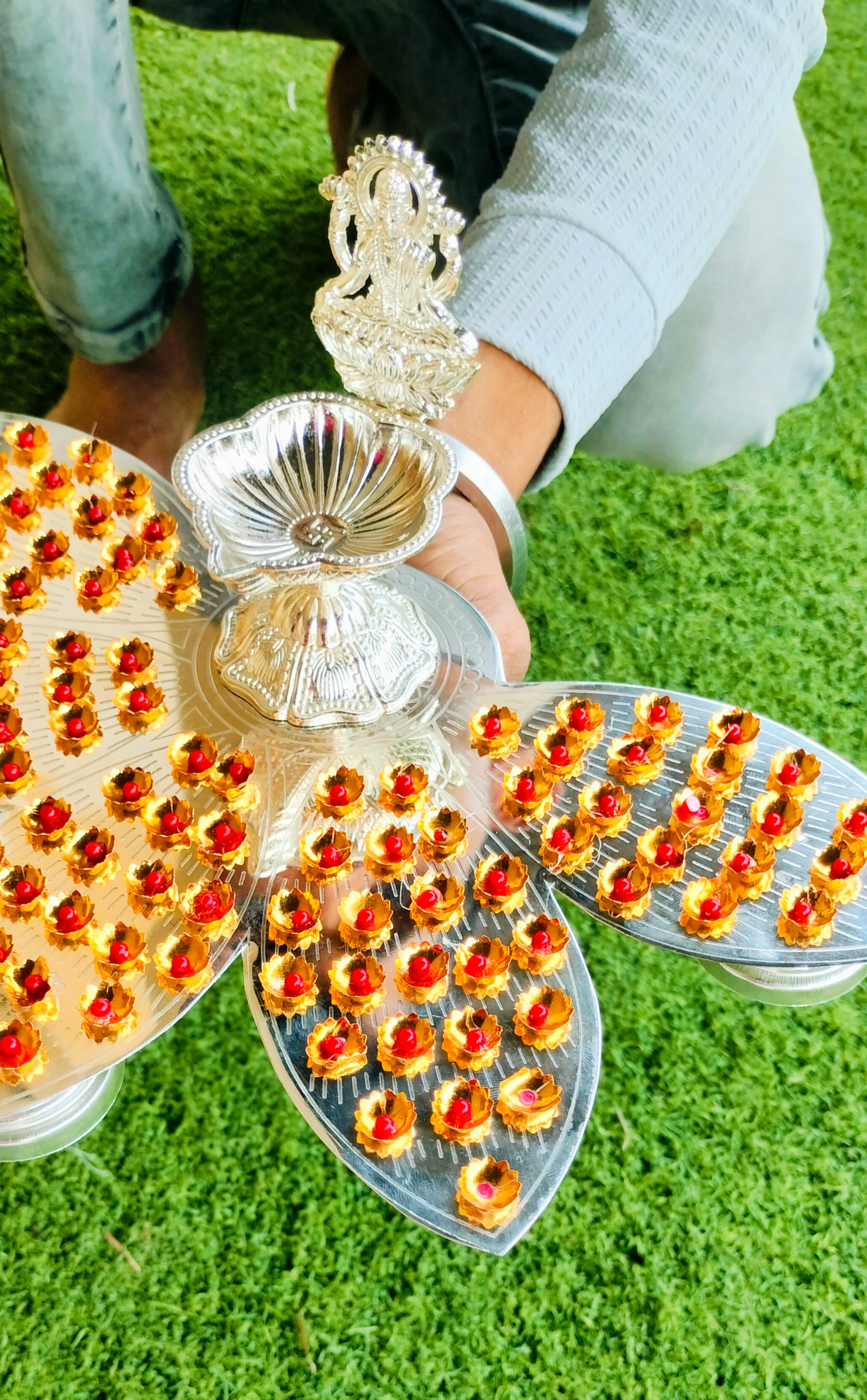 German silver lotus petals Ashtotram stand with 108 Golden red stone flower with lakshmi diya