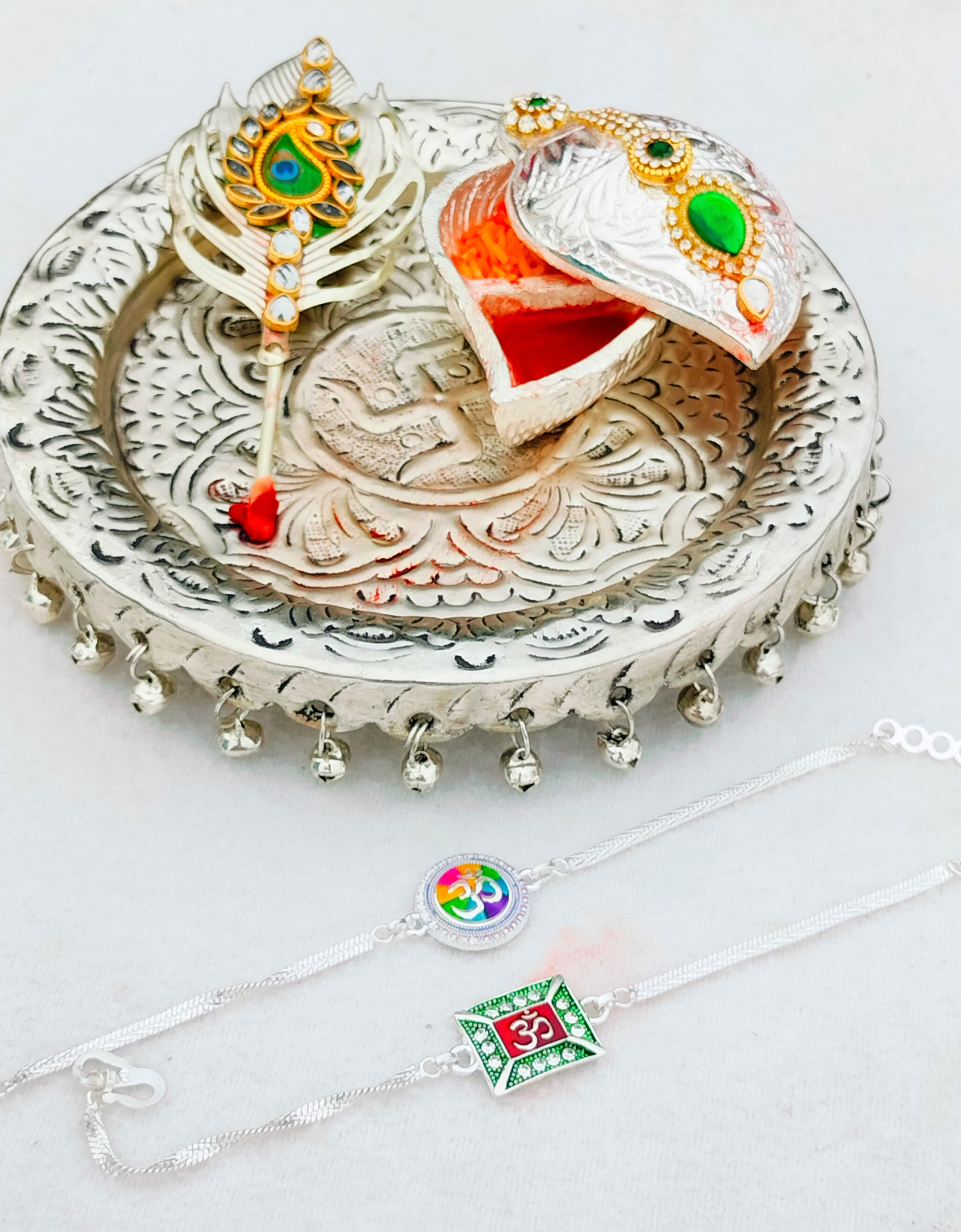 German silver Ghungaru thali with kumkum chopra & tilak stick with 2 pure silver rakhi set