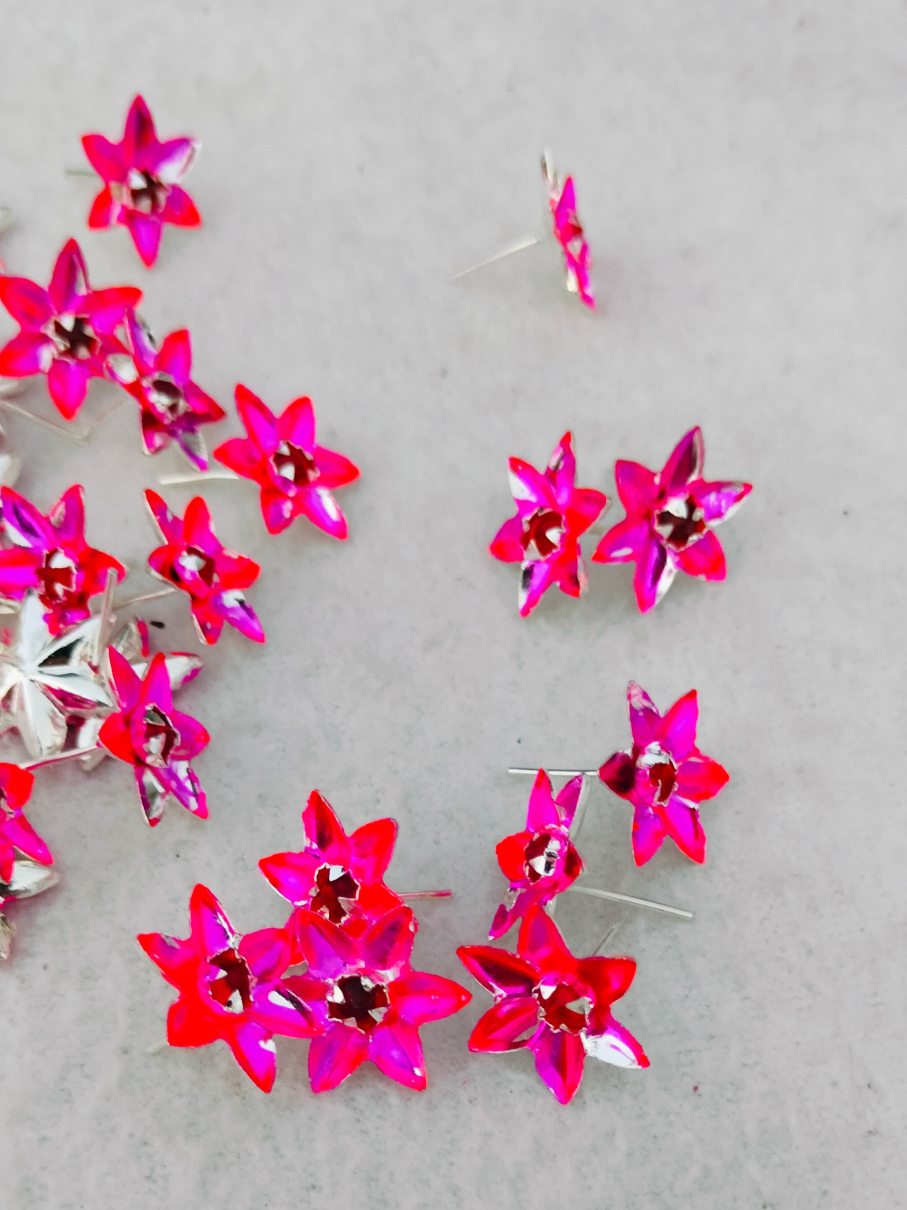 German silver lotus Ashtotram stand with 108 pink parijatham flower with lakshmi diya