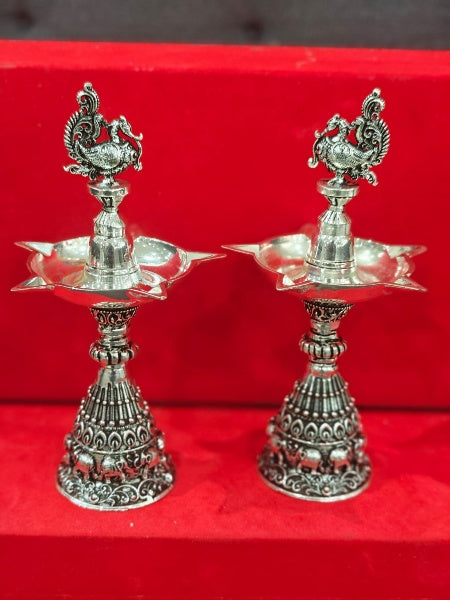 Silver Plated Antique Finish Peacock Diya with Elephant Motifs Fully Carved for Diwali Pooja