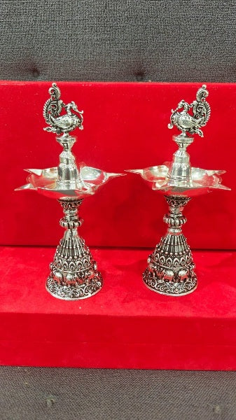 Silver Plated Antique Finish Peacock Diya with Elephant Motifs Fully Carved for Diwali Pooja