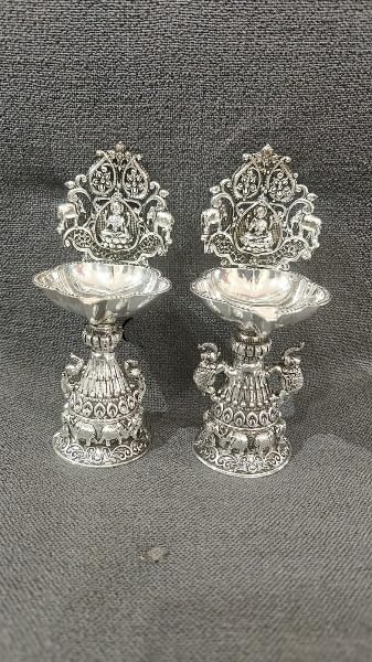 silver plated Lakshmi Diya with elephant motifs Diya pair set