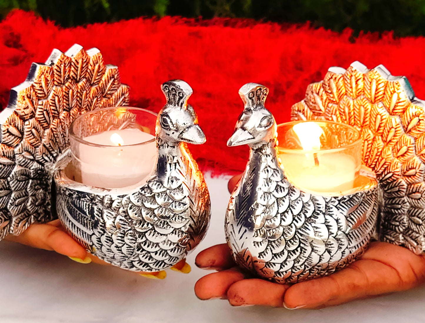 Antique finish German silver peacock pair with glass candle holder