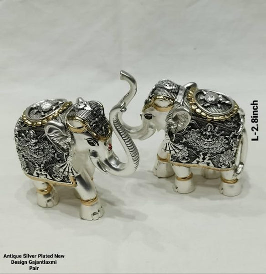 silver coated gaja lakshmi elephant pair