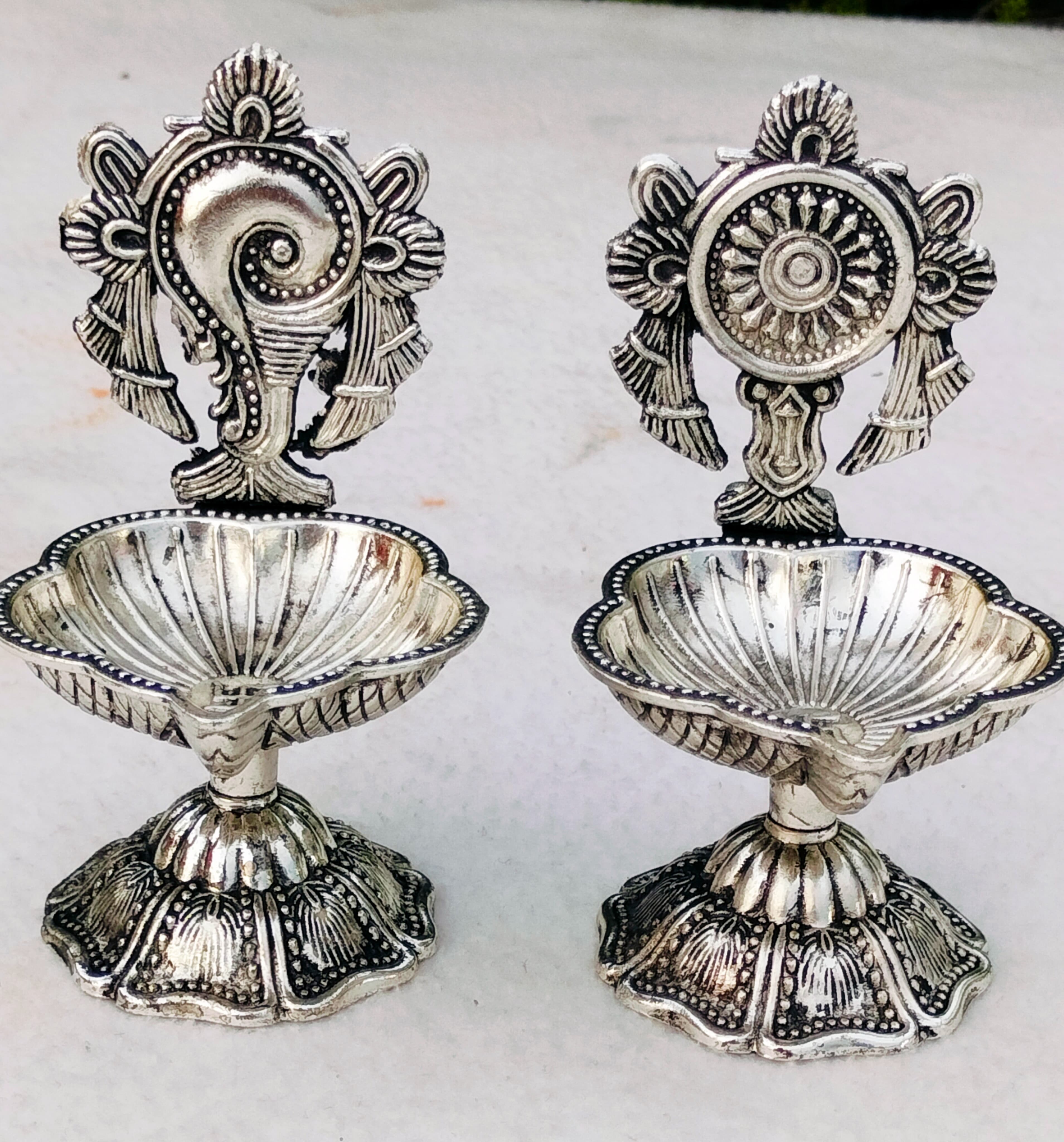 German silver shankh chakra diya pair for diwali