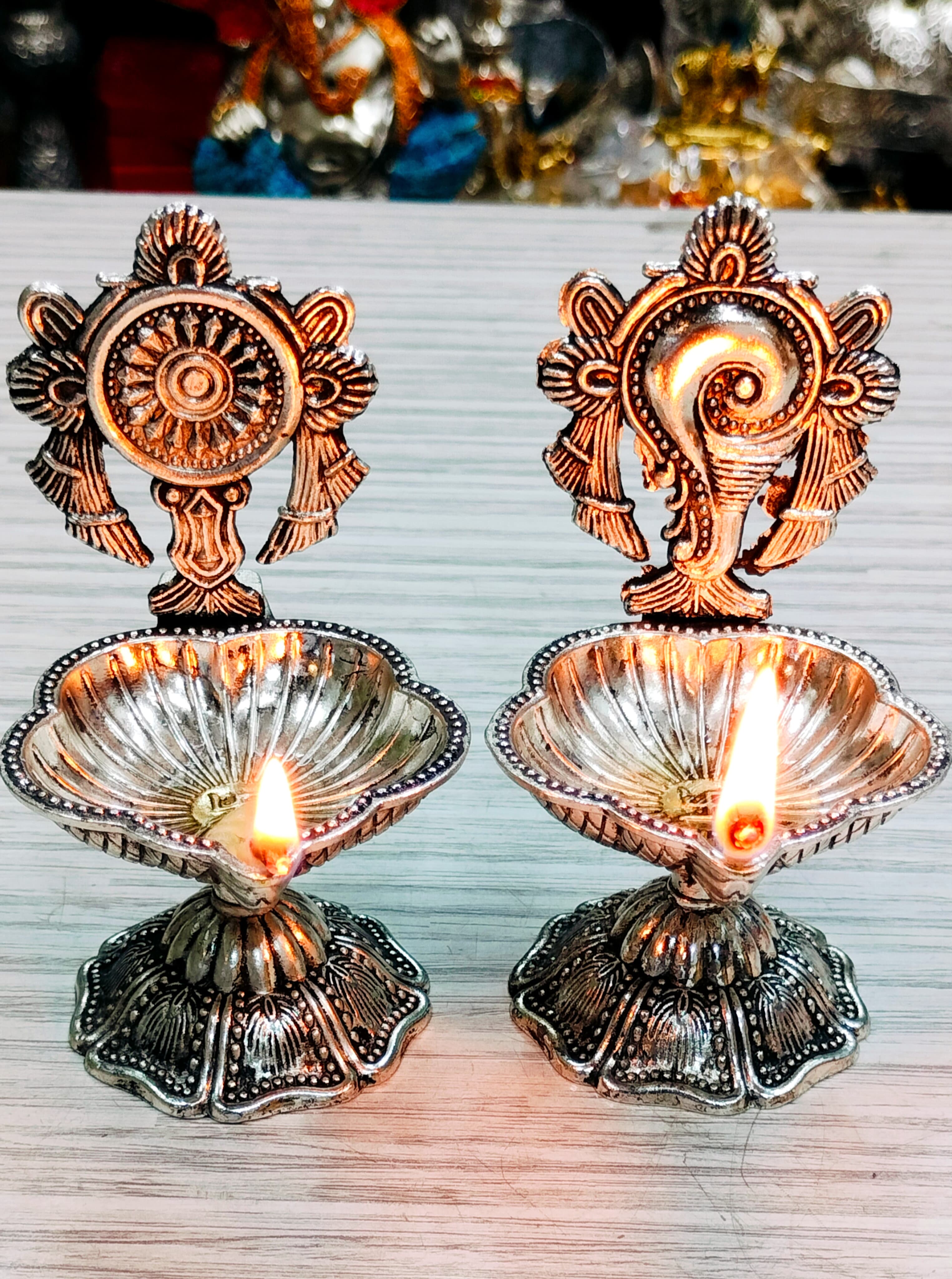 German silver shankh chakra diya pair for diwali