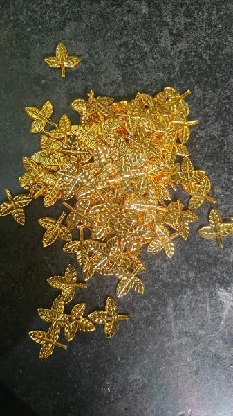 silver and golden  bilva patrey flowers