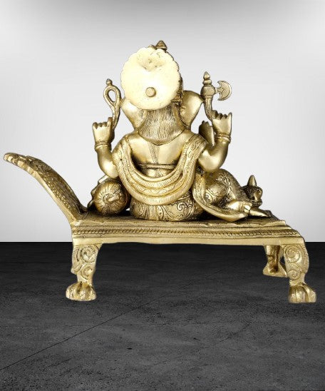 Brass Ganesh Sitting on a Royal Couch, 4 Armed Ganesh Sitting Idol for Home/Office