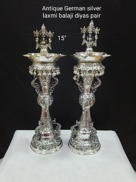 German Silver Lakshmi Balaji Diya Pair Set with Peacock Diya Set for House Warming Party