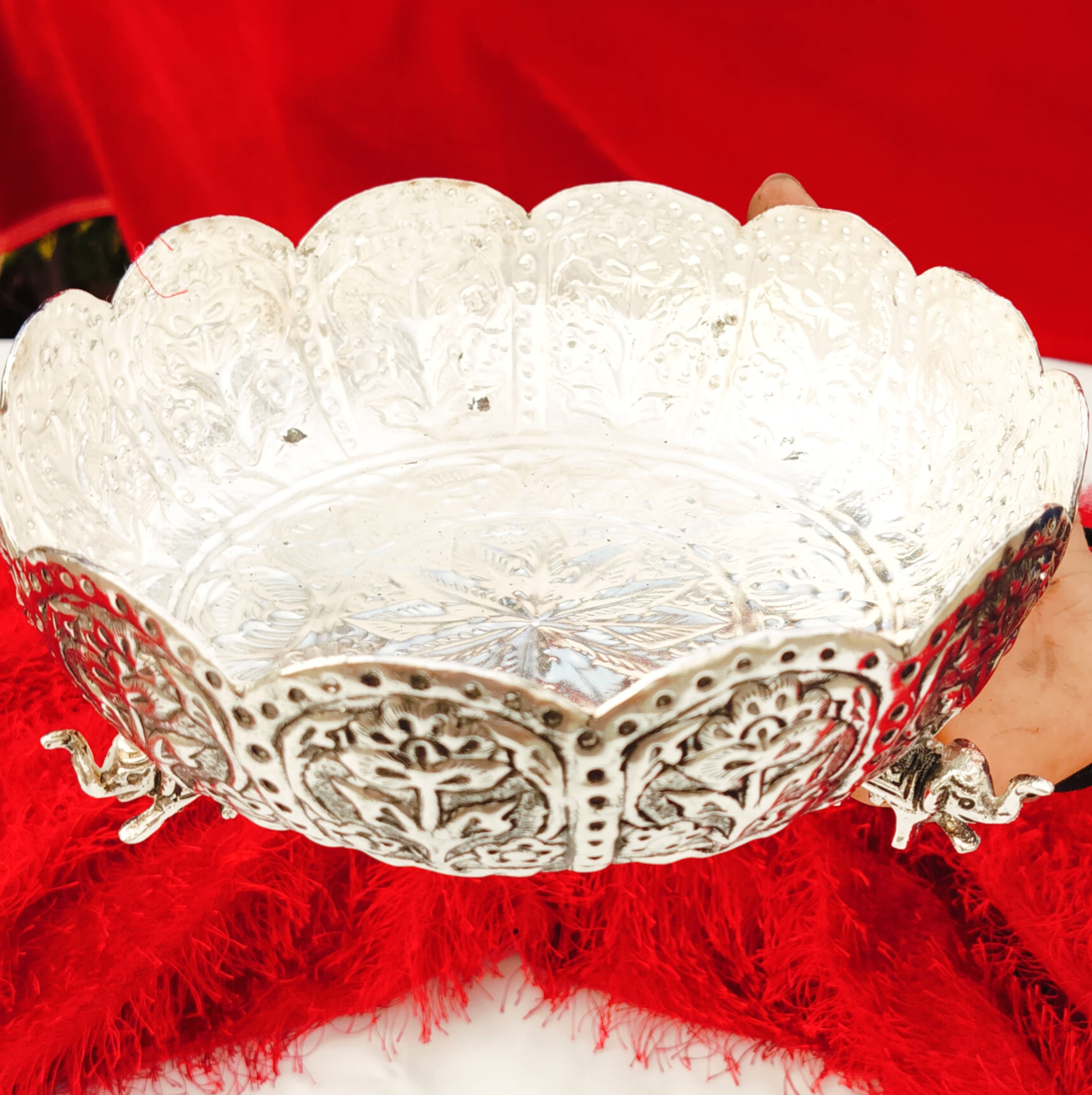 german silver fully carved urli bowl with 3 elephant legs