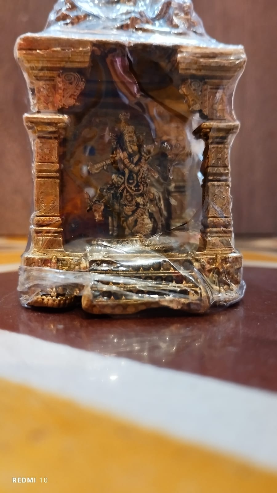 Miniature Brass Krishna in Temple – Sacred Symbol of Joy, Devotion & Protection