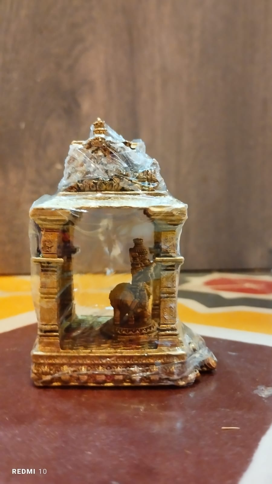 Miniature Brass Krishna in Temple – Sacred Symbol of Joy, Devotion & Protection