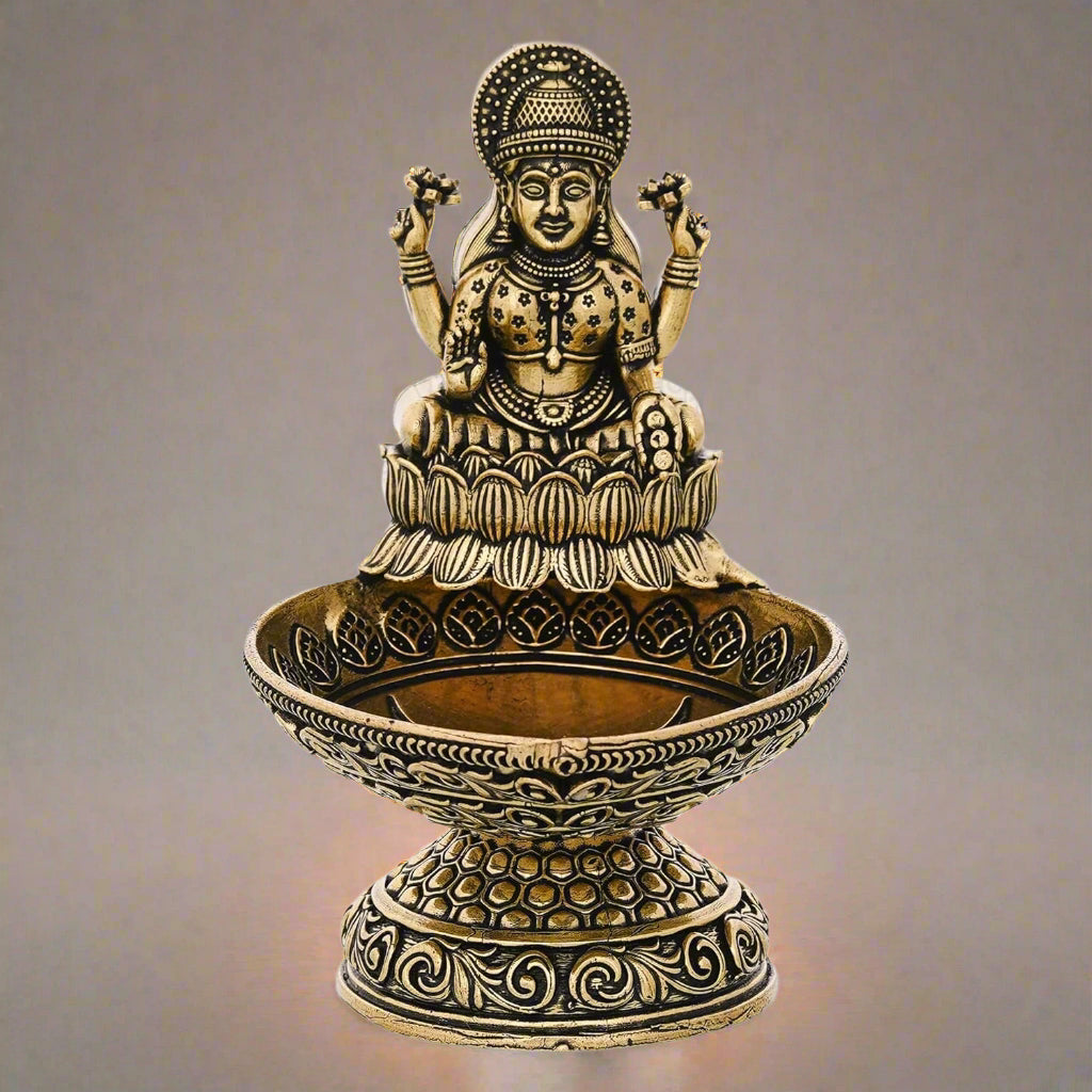 Set of 2 Brass Lakshmi Diya – Radiant Symbols of Wealth, Wisdom & Divine Grace