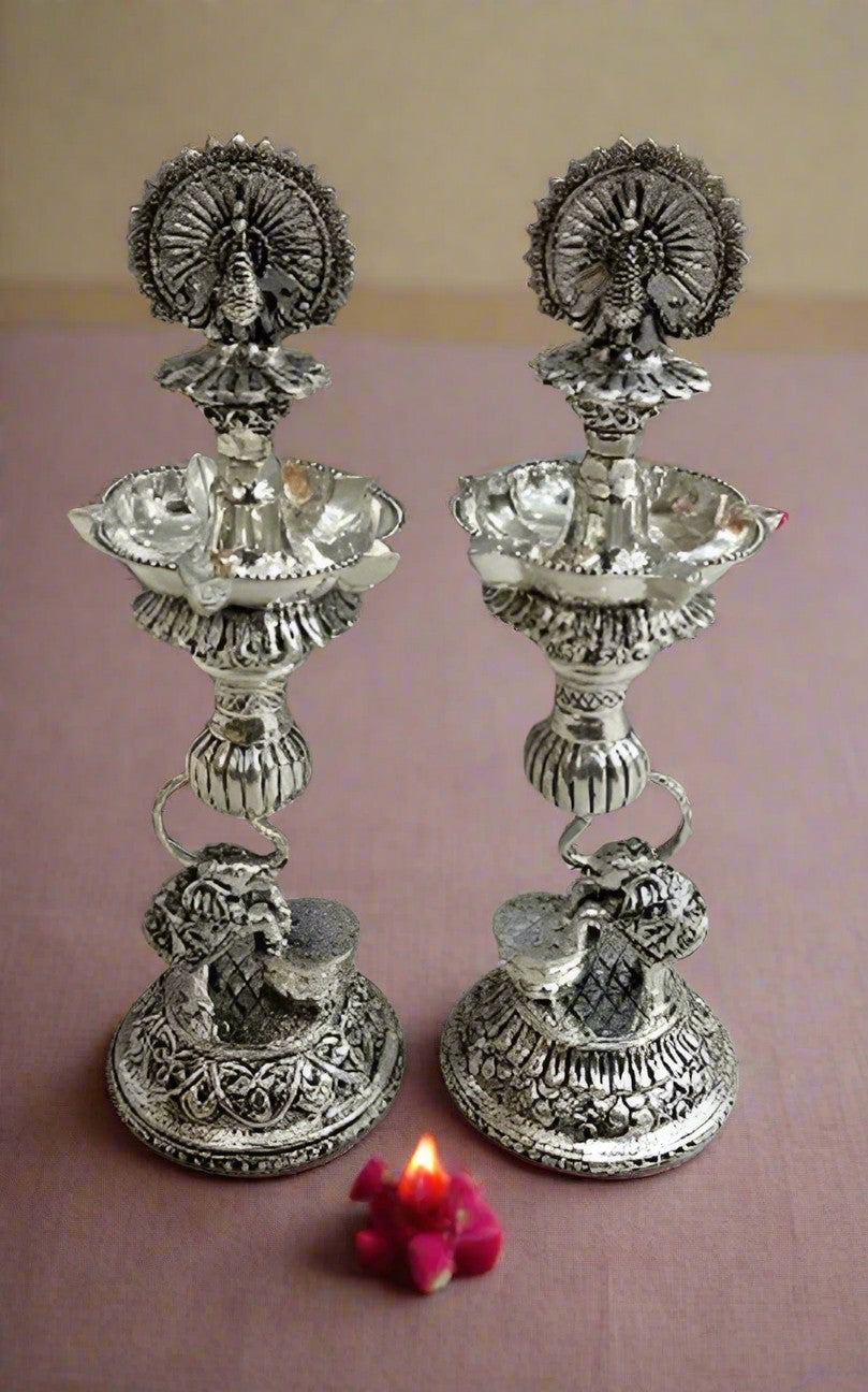 Silver Plated Dancing Peacock with Elephant Diya Pair Set