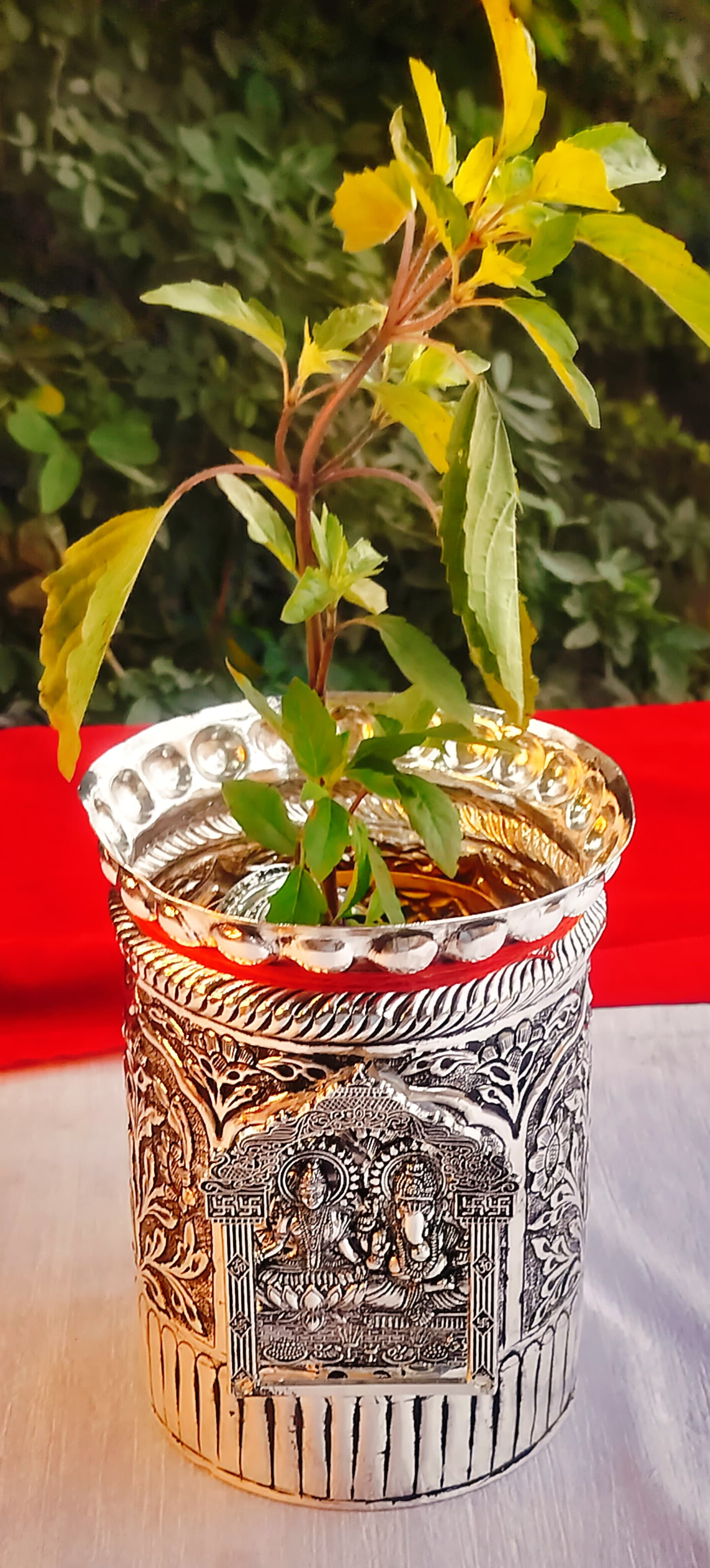 German Silver Laxmi Ganesh with Arch Embossed Round tulsi Pot for Home Decor