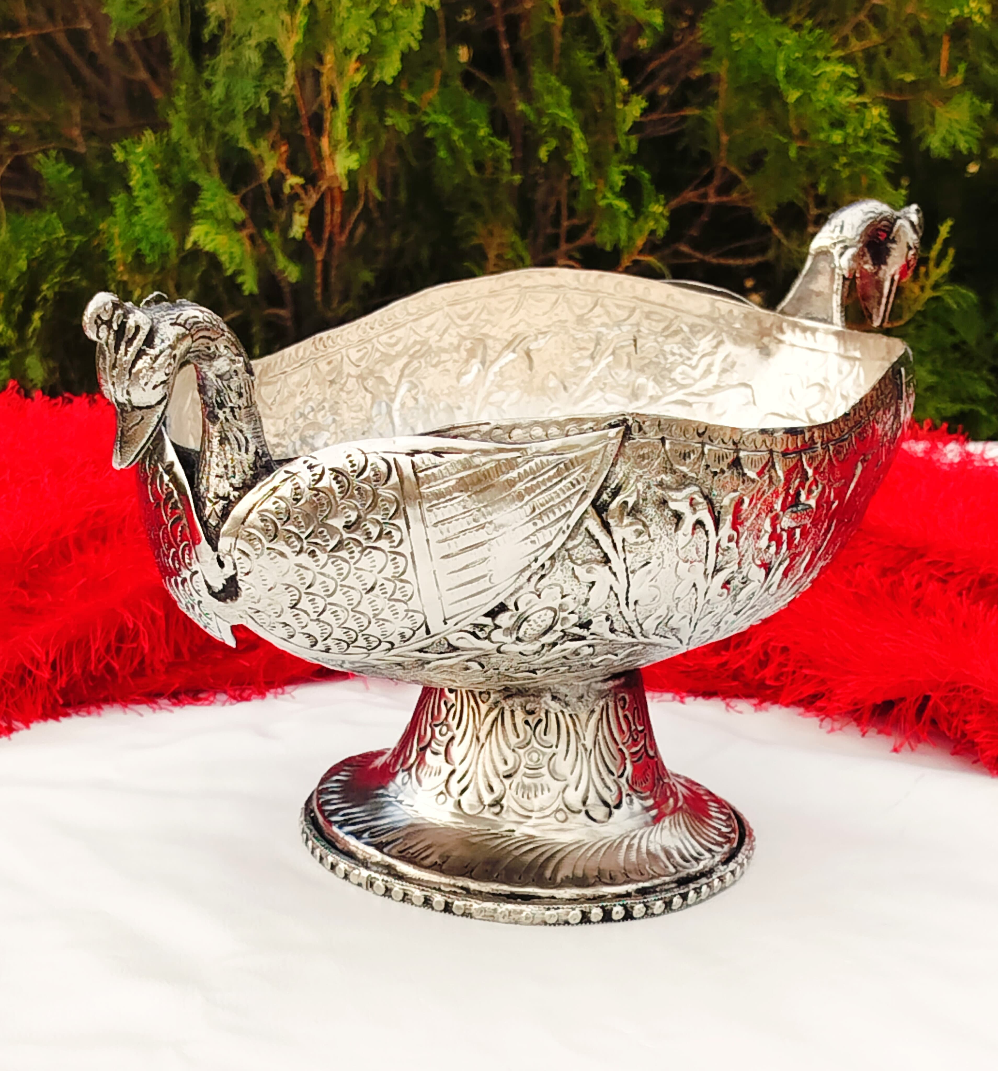 Antique finish German silver peacock urli/bowl with stand