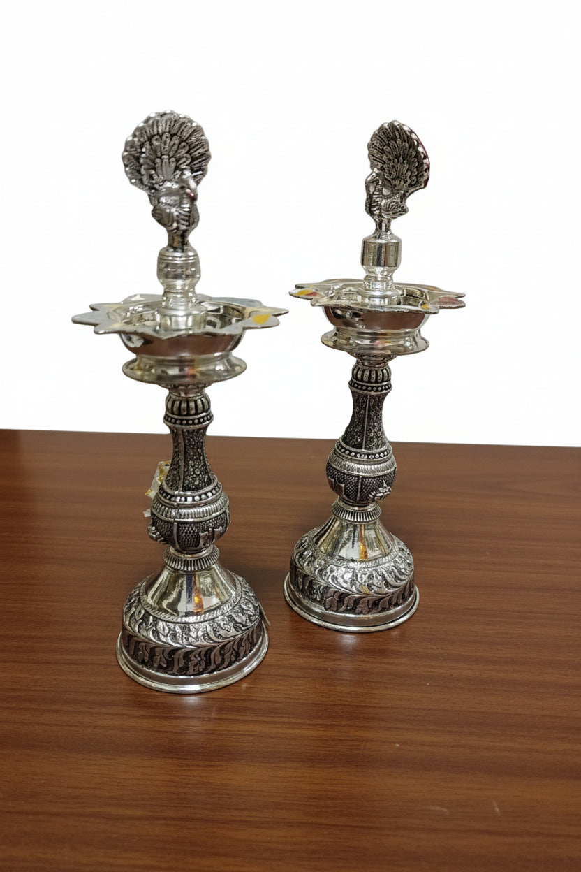 Pure Silver Plated Dancing Peacock diya with Shanku Design – Graceful Housewarming Gift & Elegant Home Décor Idol
