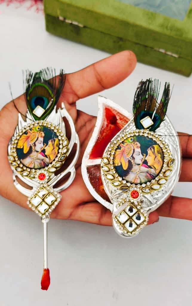 German silver Flute RADHA KRISHNA Krishna with original peacock feather design Tilak stick with sliding Roli chawal chopra set, 5 sets in a gift box