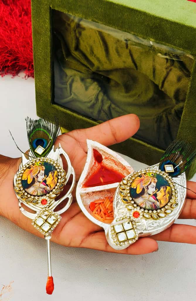 German silver Flute RADHA KRISHNA Krishna with original peacock feather design Tilak stick with sliding Roli chawal chopra set, 5 sets in a gift box