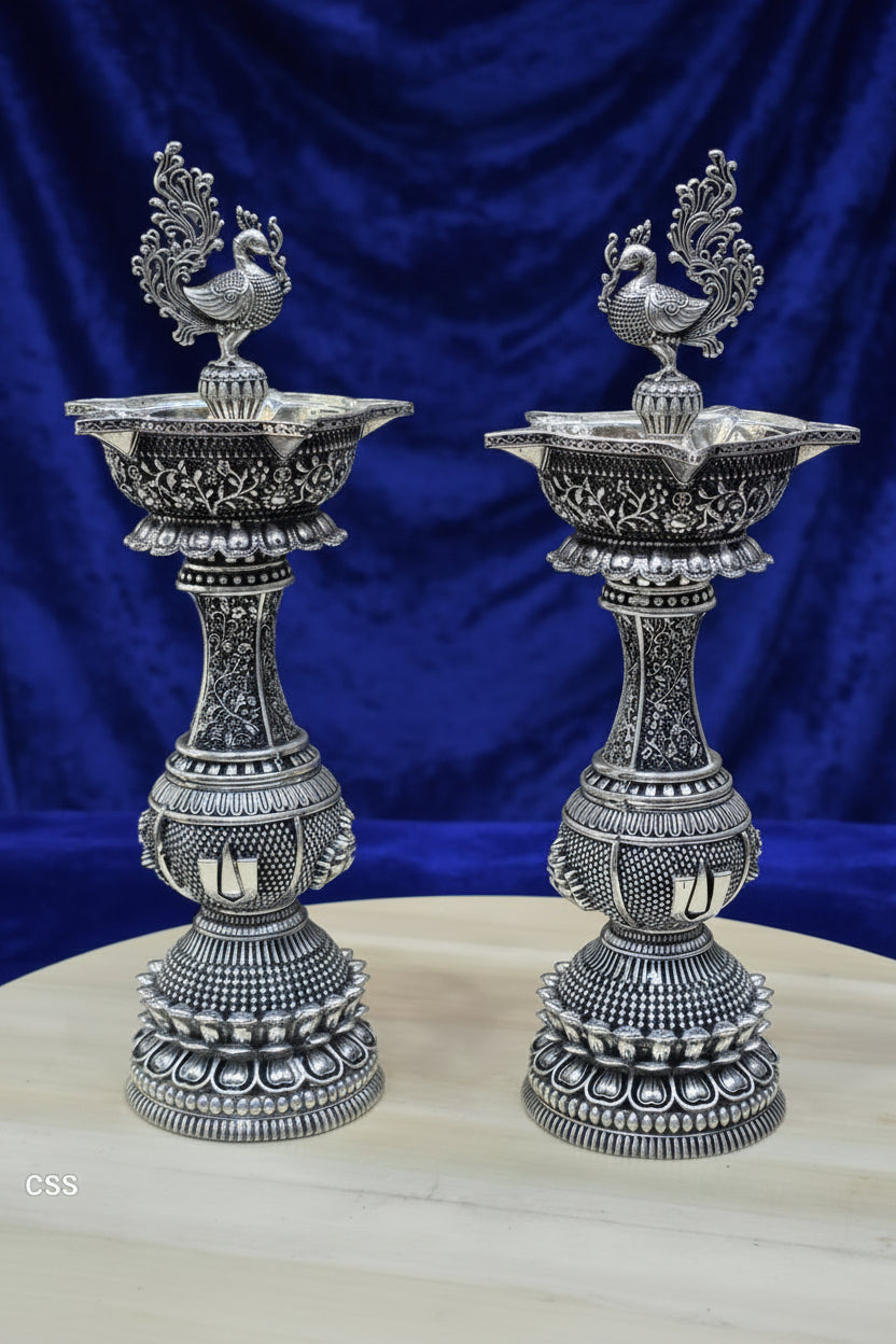 German Silver Peacock Diya 12 Inch – Antique Finish Traditional Lamp for Housewarming, Pooja & Festive Décor