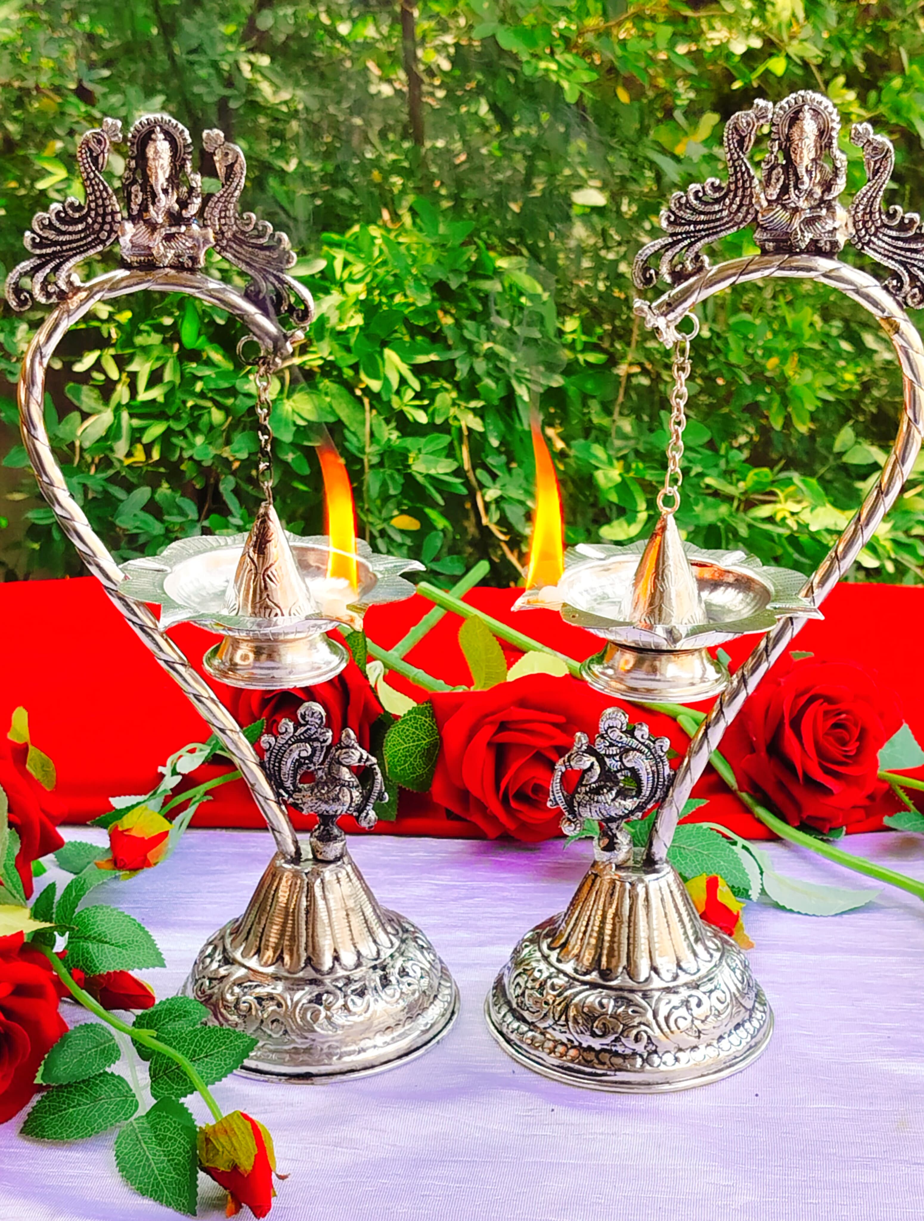German Silver vinayak with Peacock Hanging Diya Pair, Size : 15"