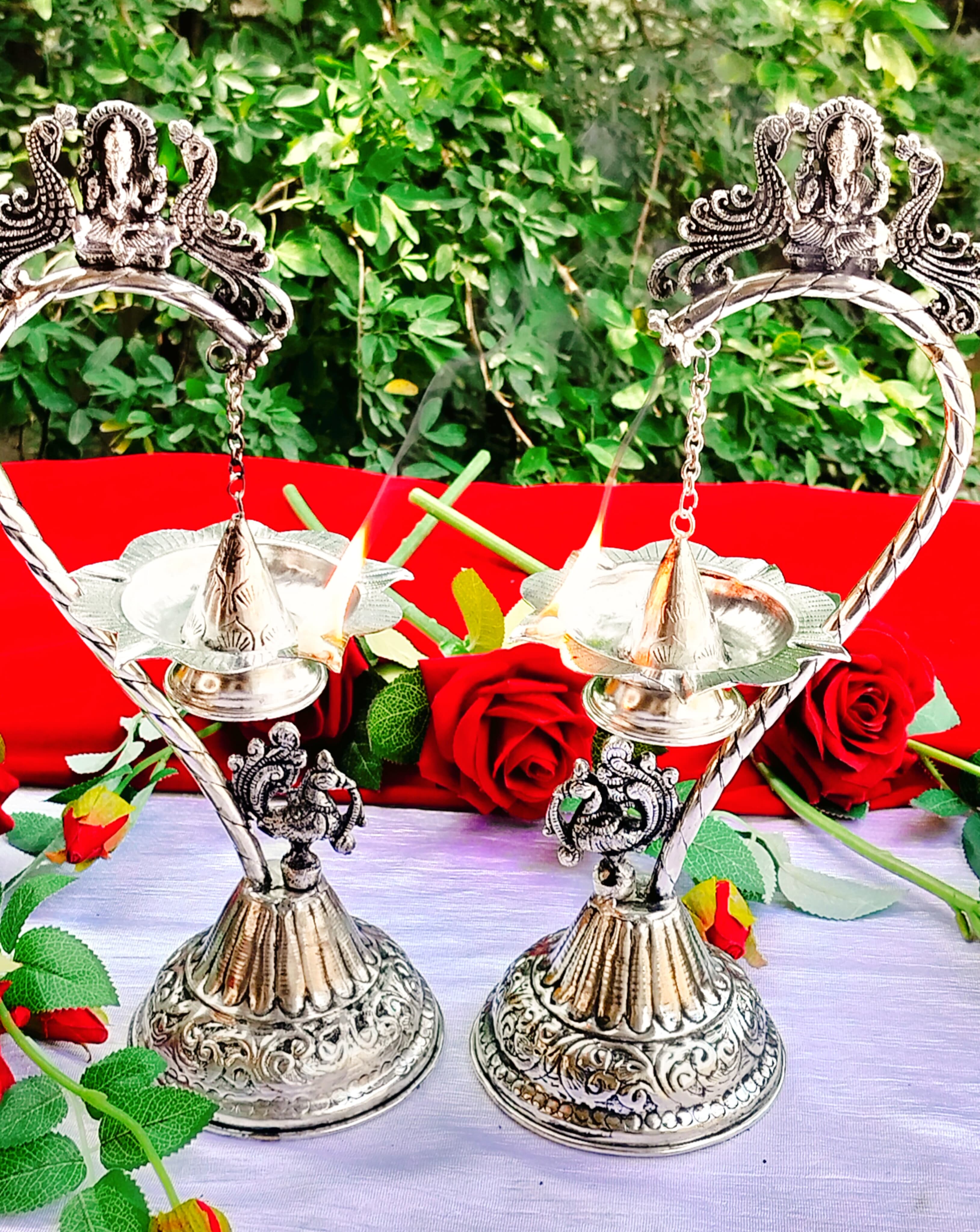 German Silver vinayak with Peacock Hanging Diya Pair, Size : 15"