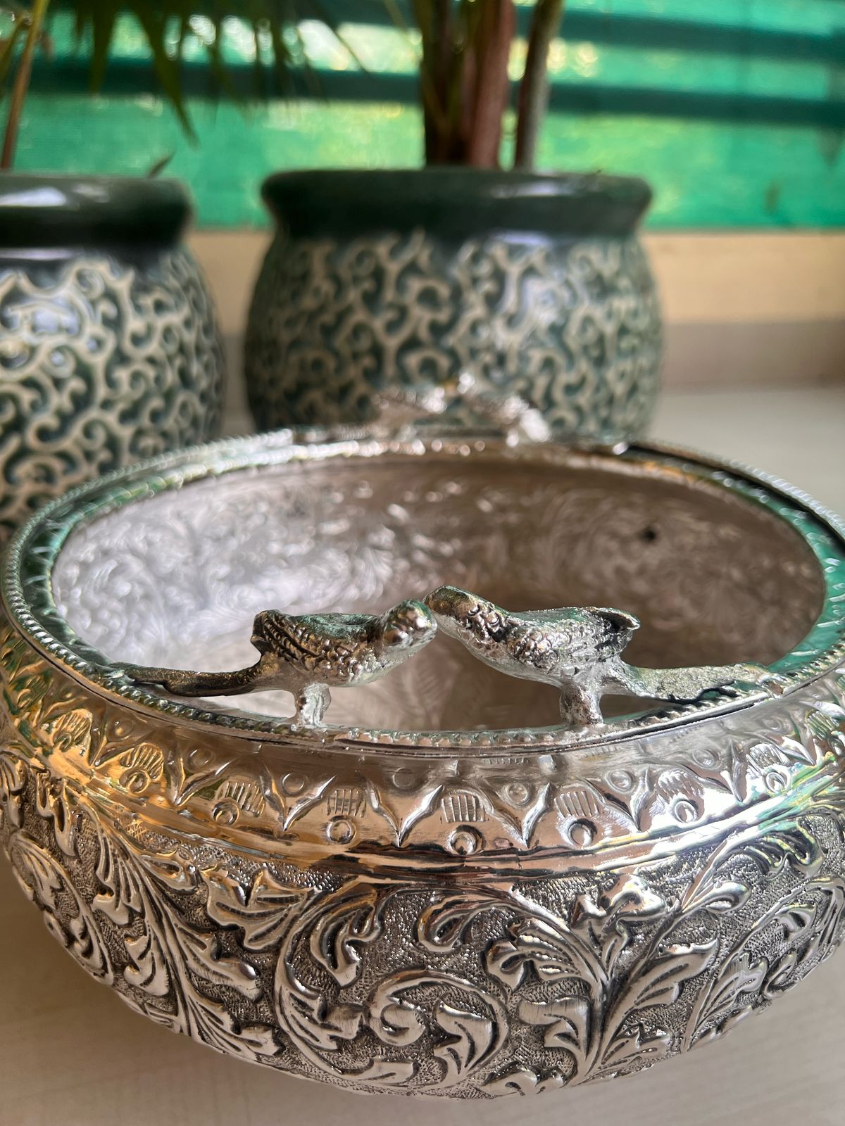 German silver parrot urli with stand