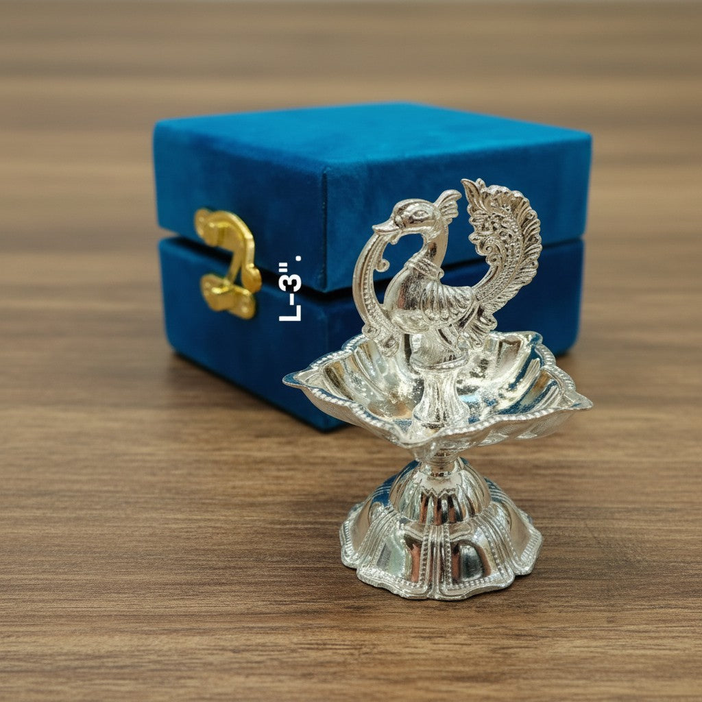 German silver peacock diya set of 2 with velvet gift box for festive décor and gifting.
