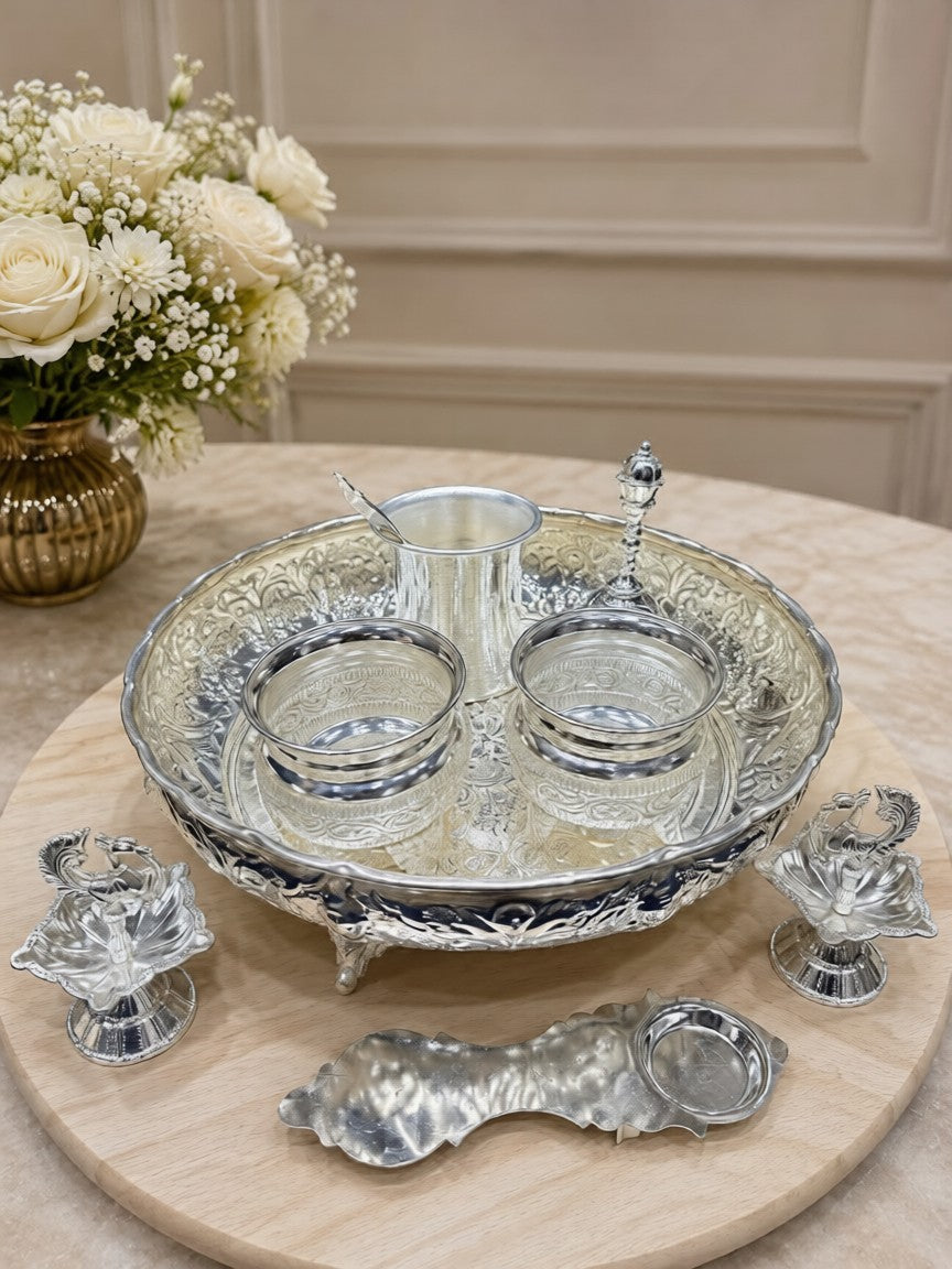 German Silver Pooja Thali Set 8 Piece with 10 inch tray, kumkum bowl set, diyas and Lakshmi mukut for Hindu pooja rituals, Diwali decor, home temple decoration and festive gifting.
