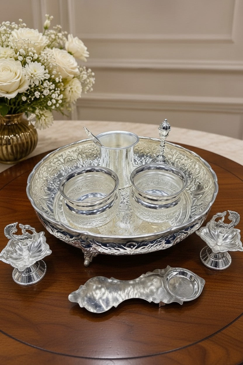 German Silver Pooja Thali Set 8 Piece with 10 inch tray, kumkum bowl set, diyas and Lakshmi mukut for Hindu pooja rituals, Diwali decor, home temple decoration and festive gifting.