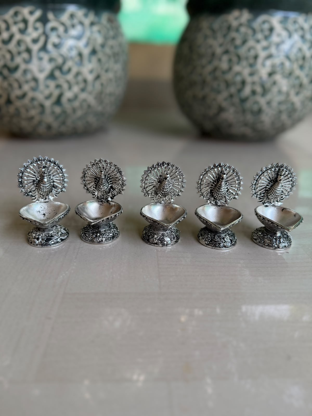 German Silver Dancing Peacock Diya – Set of 4 Elegant Pooja Décor