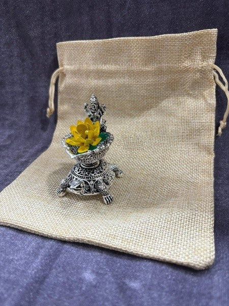 silver plated set of 2 lakshmi diya with lotus and bag for home/ gift item