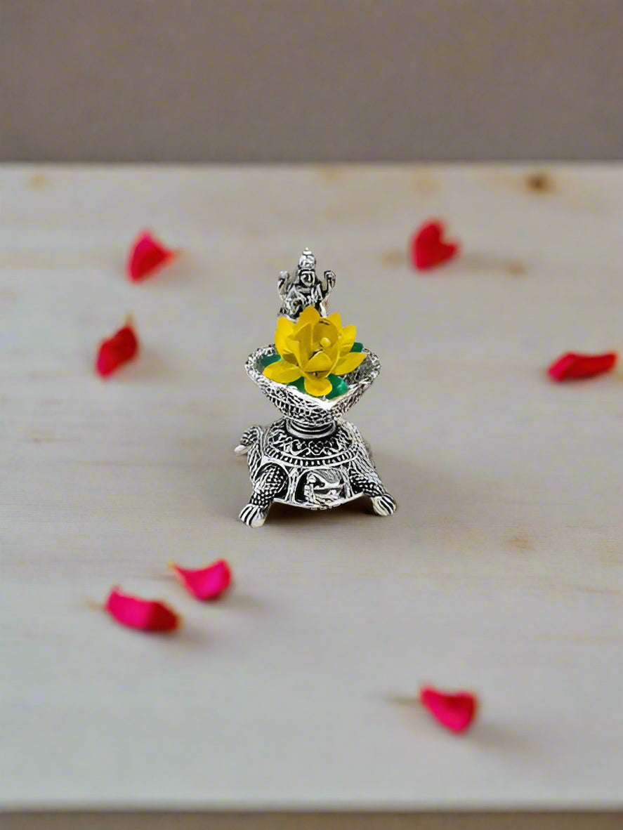 silver plated set of 2 lakshmi diya with lotus and bag for home/ gift item