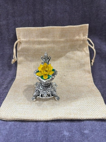 silver plated set of 2 lakshmi diya with lotus and bag for home/ gift item