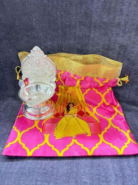 german silver 2 kamakshi / lakshmi diya set with 2 potli for home/ gift item
