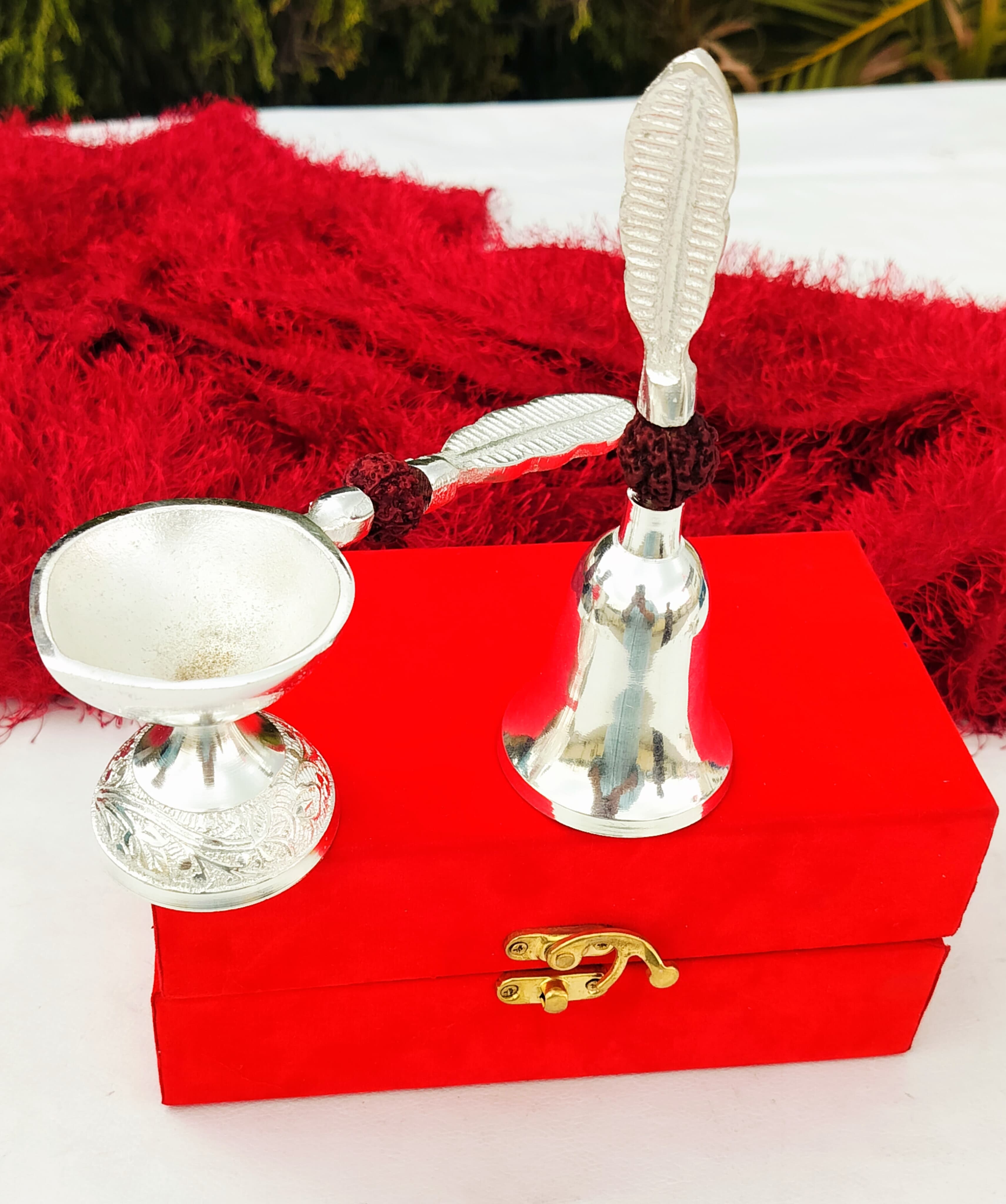 german silver rudraksha diya with bell with velvet box